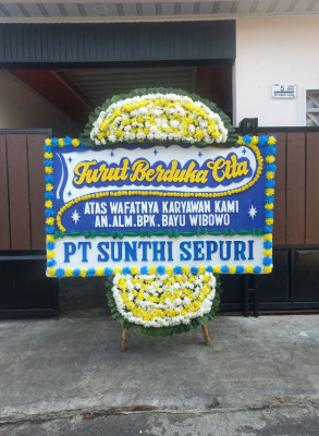 Papan Bunga Duka di Kai
