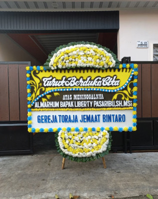 Papan Bunga Duka di Kai