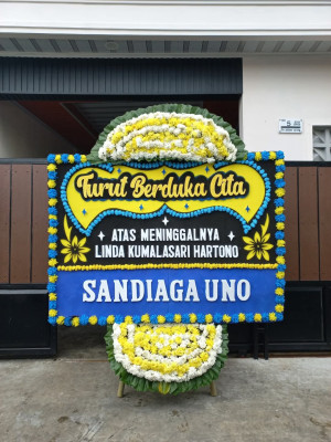 Papan Bunga Duka di Kai